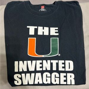 University of Miami T-shirt. Black with orange/green detail. Size XL.